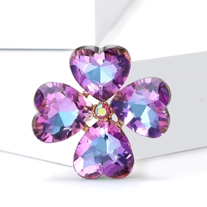 Elegant four-leaf clover crystal brooch with purple heart-shaped petals and gold base
