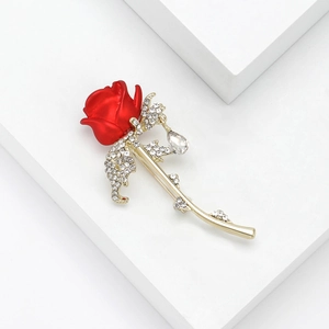 Elegant red enamel rose brooch with gold-plated leaves and sparkling crystal rhinestones