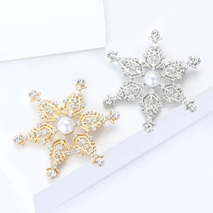 Broches flocons de neige élégantes en or et argent avec strass et perle centrale