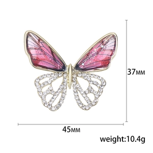 Elegant butterfly brooch with pink wings and crystals, dimensions 45mm by 37mm