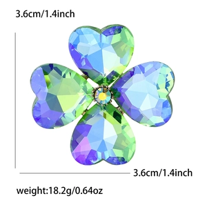 Elegant four-leaf clover crystal glass brooch with iridescent heart-shaped petals and yellow rhinestone