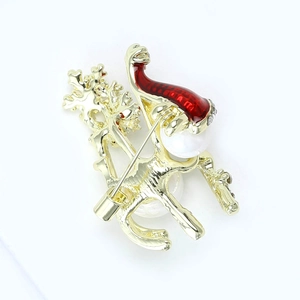 Christmas reindeer and tree brooch in gold metal with pearls and red enamel hat