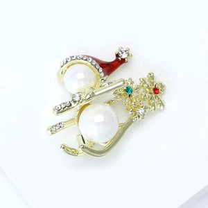 Christmas snowman brooch with large white pearls and red enamel hat on golden base