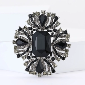 Elegante spilla vintage in lega con grande cristallo nero e gemme a forma di goccia