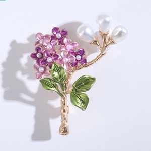 Detailed close-up of hydrangea brooch with purple enamel flowers and white pearl accents