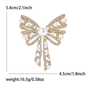 Elegant gold bow brooch with white pearls and sparkling rhinestones for sweaters