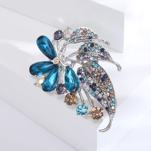 Elegant silver flower brooch with large blue crystal and colorful rhinestones for women