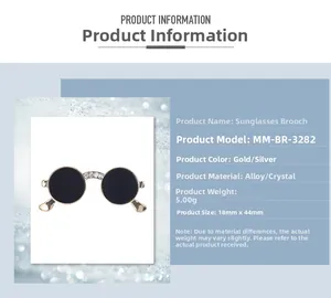 Detailed view of silver sunglasses brooch with rhinestones and technical product dimensions