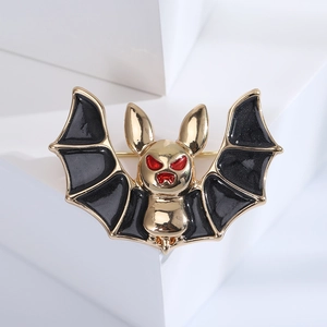 Gothic bat brooch for men in gold-tone alloy with black enamel and red eye accents