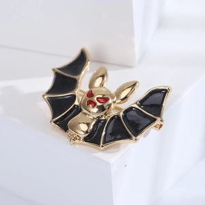 Gothic gold alloy bat brooch with black enamel wings and red crystal eyes for men's suits