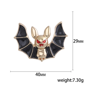 Gothic bat-shaped men's brooch in gold metal and black enamel finish for suits