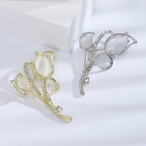 Eleganti spille a tulipano in oro e argento con pietra occhio di gatto e cristalli lucidi