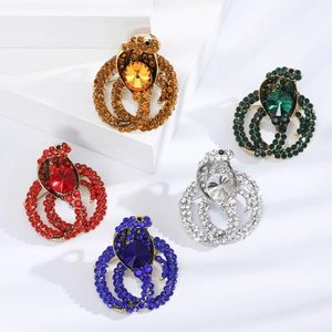 Elegant cobra snake brooches set with vibrant rhinestones in five assorted colors