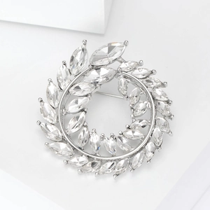 Élégante broche couronne branche d'olivier argentée avec cristaux brillants taille marquise