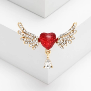 Elegant gold-plated wing heart brooch with red enamel and dangling teardrop zircon
