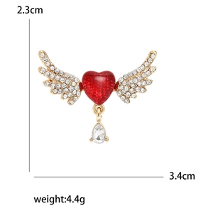 Elegant gold heart wings brooch with rhinestones and cat eye stone for women