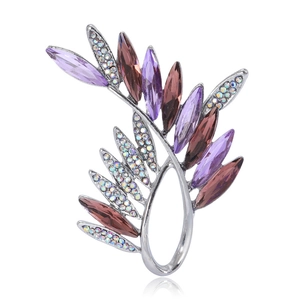 Elegant silver leaf brooch with colorful marquise crystals and shimmering rhinestones