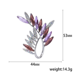 Elegant olive branch brooch with purple crystals and rhinestones, size 44mm x 53mm