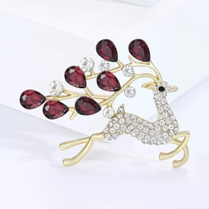 Élégante broche de renne plaquée or avec strass et pierres précieuses rouges