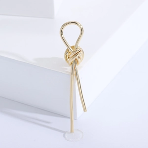 Minimalist knot brooch in polished gold finish for stylish suits and sweaters