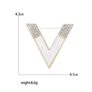 Elegant gold V-shaped brooch with clear rhinestones and white shell inlay, size 4.3x4.1cm