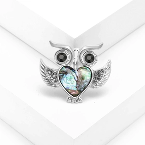 Chic silver owl brooch with a heart-shaped abalone shell inlay and black gem eyes