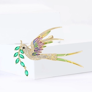 Elegant swallow brooch with micro-set zircon and green willow branch on white stone base