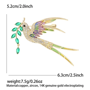 Creative swallow brooch in gold plated brass with micro-set zircon and branch detail
