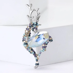 Elegant deer brooch with K9 rainbow crystal and colorful rhinestones on white display