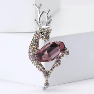 Elegant deer brooch with purple crystal gemstone and colorful rhinestones on silver base
