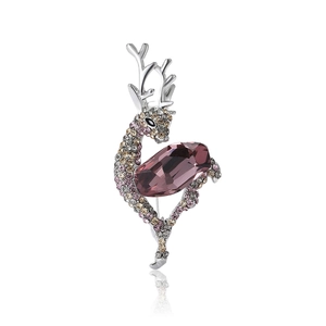 Elegant silver deer brooch with sparkling purple gemstone and colorful rhinestones