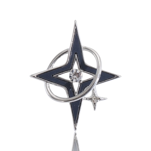 Silver hexagram star brooch with black enamel, crystal center, and orbital ring detail