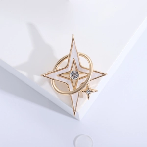Minimalist gold hexagram star brooch with white enamel and sparkling zircon center