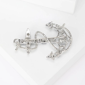 Silver vintage anchor brooch with nautical rope detail and safety pin closure back
