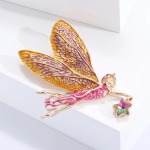 Exquise broche fée fleur en alliage doré avec ailes en émail orange et étoile colorée