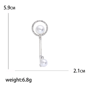 Elegant silver key brooch with white pearls and sparkling rhinestones for coats