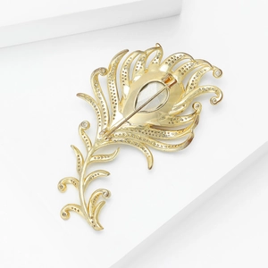 Detailed back view of feather brooch showing pin clasp and hollow alloy structure