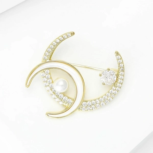 Elegant gold crescent moon brooch with zircon pave and central white pearl accent