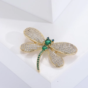 Exquisite gold-plated dragonfly brooch with white cubic zirconia and green gemstones