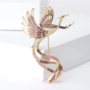 Detailed side view of luxury phoenix brooch with purple gradient glitter and zircons