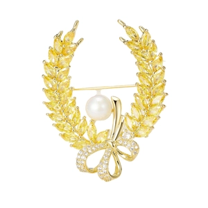 Elegant gold wheat wreath brooch with yellow crystals, white pearl and crystal bowknot