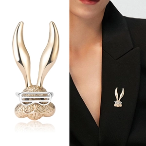 Fashion rabbit brooch with glasses, metal texture shown on white and on a suit
