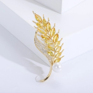 Elegant gold wheat ear brooch with yellow zircons, crystals and white pearl accent