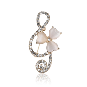 Elegant gold treble clef music note brooch with opal hearts and sparkling rhinestones