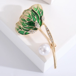 Elegant gold-plated tulip flower brooch with green enamel and a large white pearl