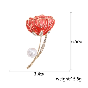 Exquisite flower brooch in red enamel with white crystals and a pearl accent