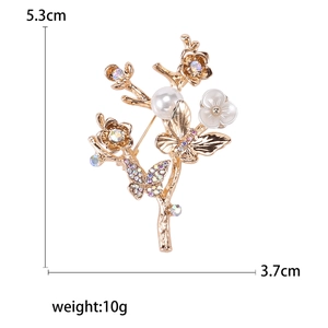 Broche papillon et fleur dorée élégante avec perle et cristal, taille 5,3cm x 3,7cm