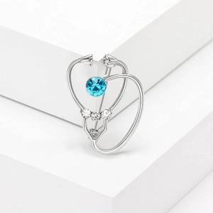 Silver stethoscope brooch with blue rhinestone inlay and crystals for medical staff