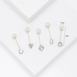 Elegante juego de broches de perlas y strass dorados con diversas formas geométricas