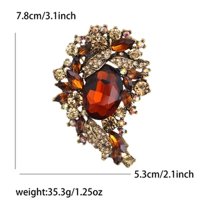 Vintage large crystal brooch with amber glass and rhinestones in antique gold finish